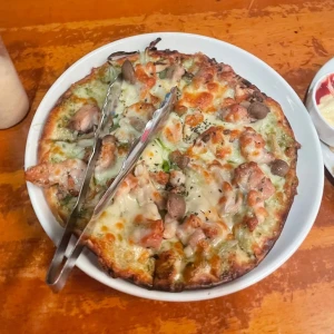 ピザ🍕の写真1枚目